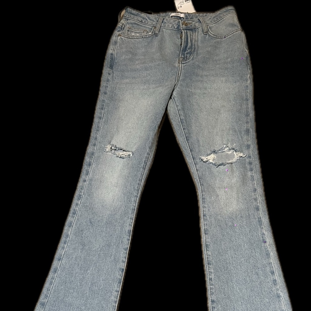 Women's Distressed Blue Jeans